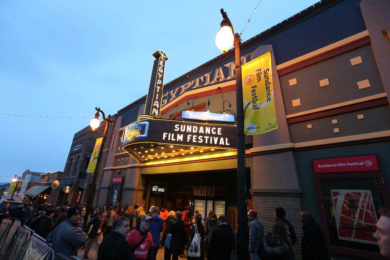 A crowd waits outside The Egyptian Theater in Park City, Utah.