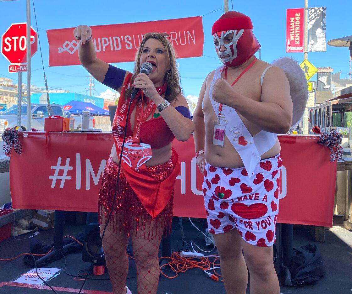 Amy Boulas of the Children's Tumor Foundation hyping up the crowd at the Cupid's Undie Run Pre-Party.