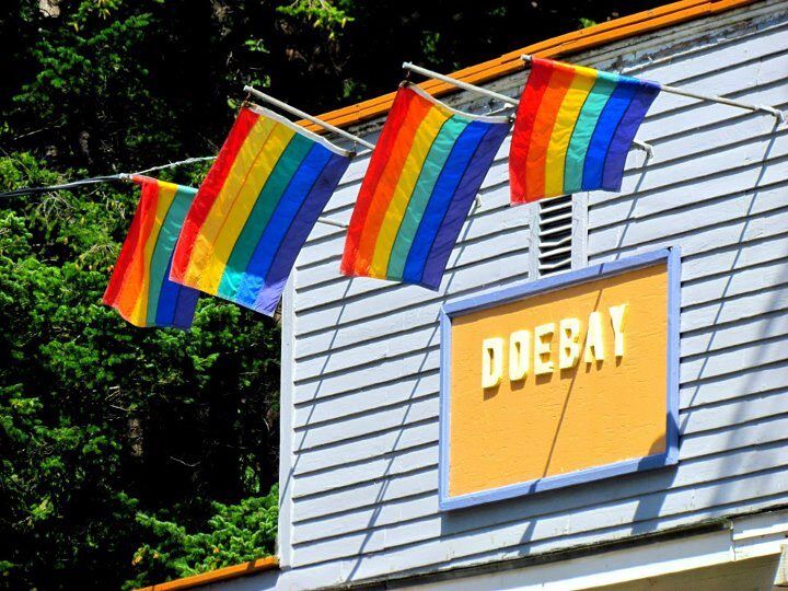 Doe Bay's rainbow flags show support for the LGBTQ+ community.