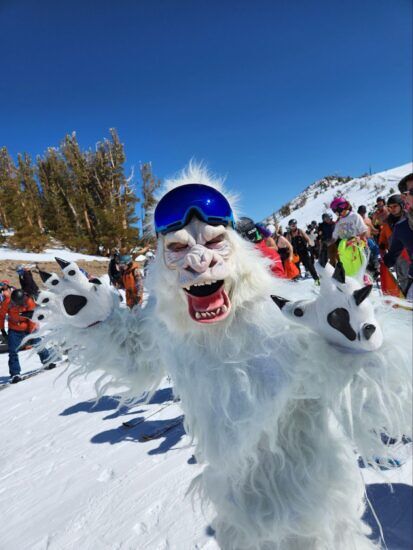 A participant dressed in a Yeti costume and snow goggles.