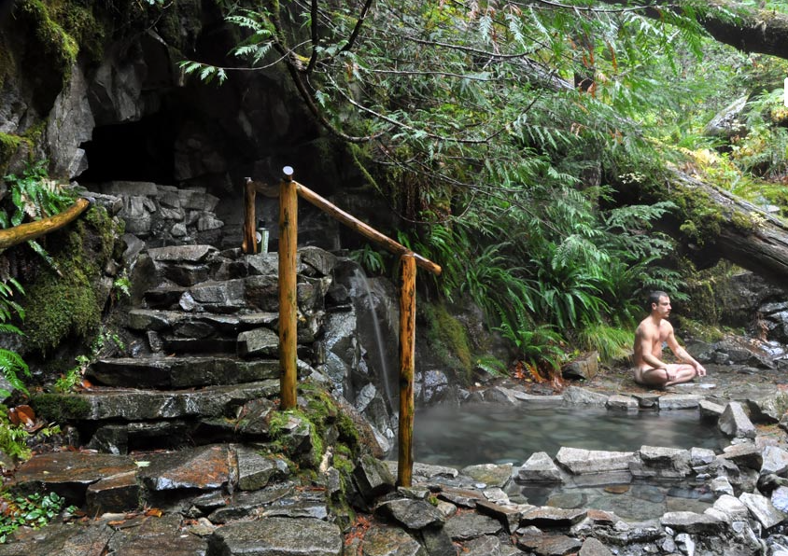 High in the remote Washington wildnerness you'll find a fern laden steaming bath of healing waters.
