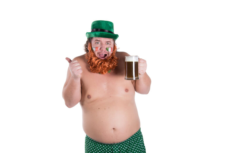 A man in a fake orange beard holding a beer stein.