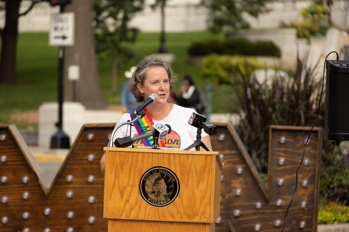 Mayor Satya Rhodes-Conway giving remarks at the Madison Rainbow Crosswalk ribbon-cutting ceremony. 