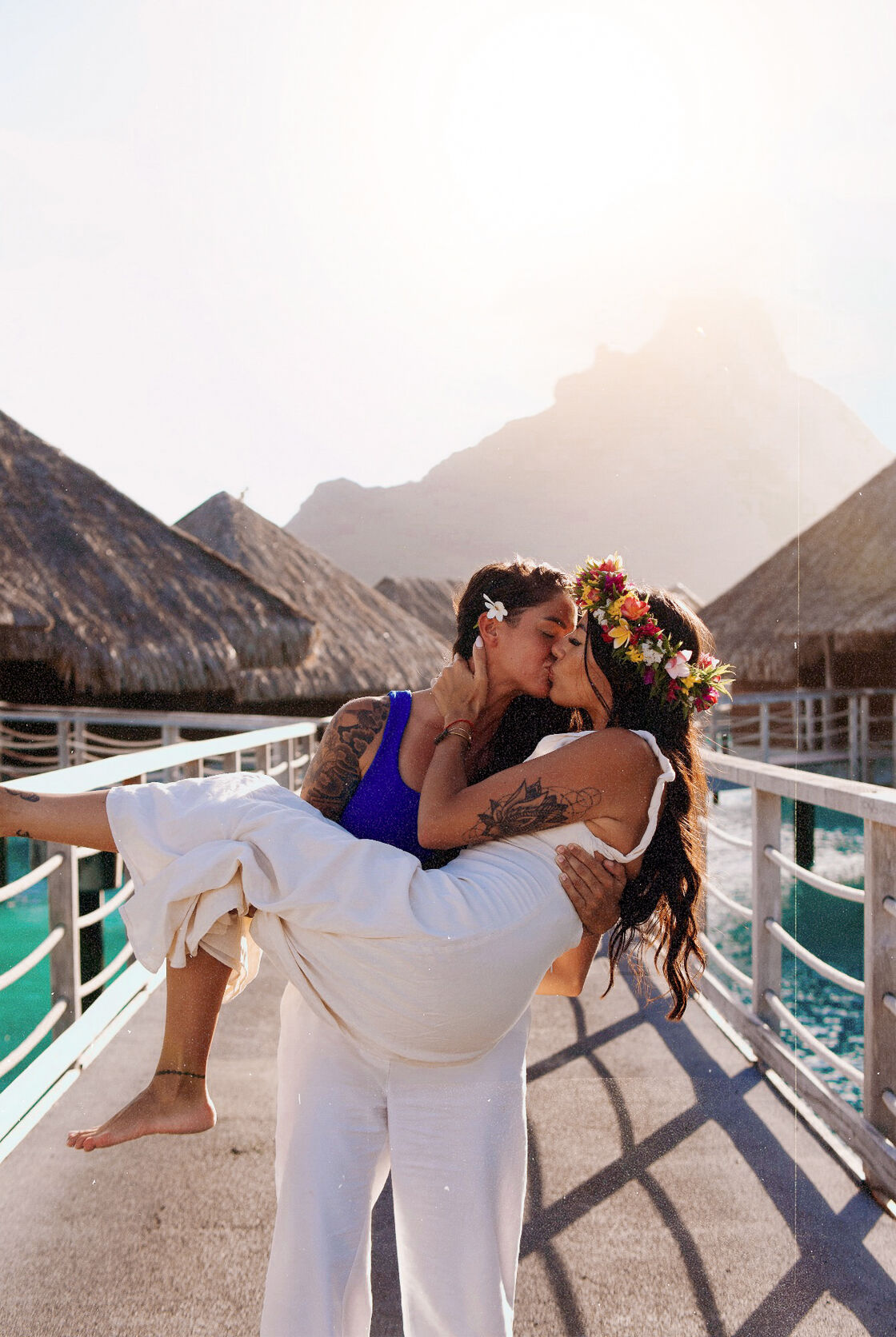 Kirstie Pike and Christine Diaz smooching in Tahiti.