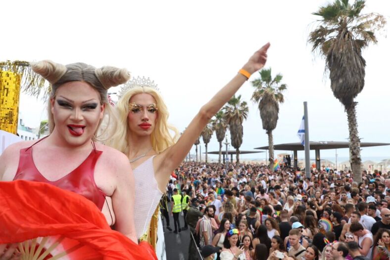 Dancers on a float overlook the crowd Tel Aviv Pride 2023