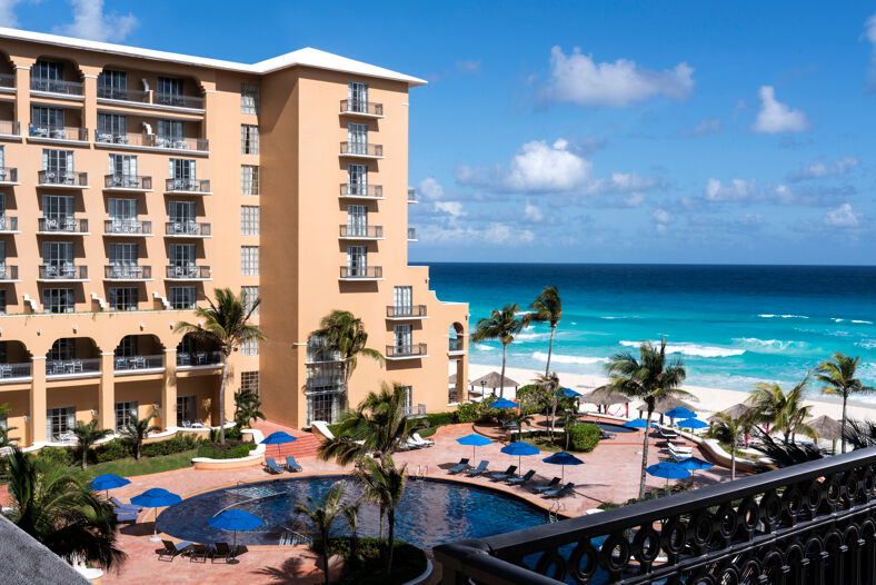 The pool and ocean view at the Mexican resort Kempinski Hotel Cancun