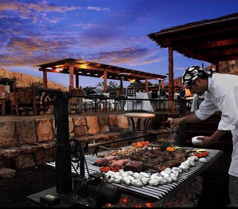 A freshly grilled meal at Alto Atacama Desert Lodge and Spa in Chile, an LGBTQ+-friendly resort in South America.