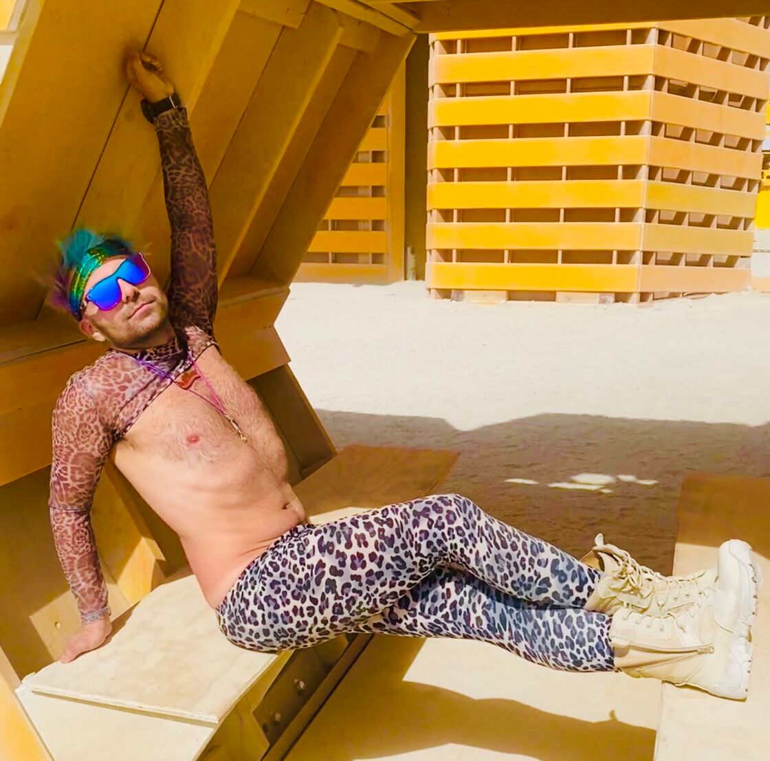 Virgin Burner Joey Castellani reclining in one of the Man's honeycombs.