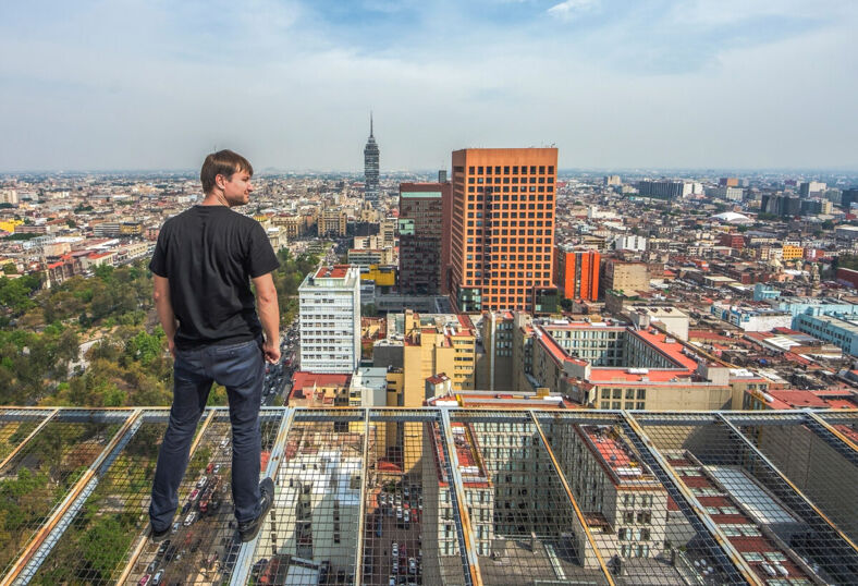 A man stands on a helipad in Mexico City.