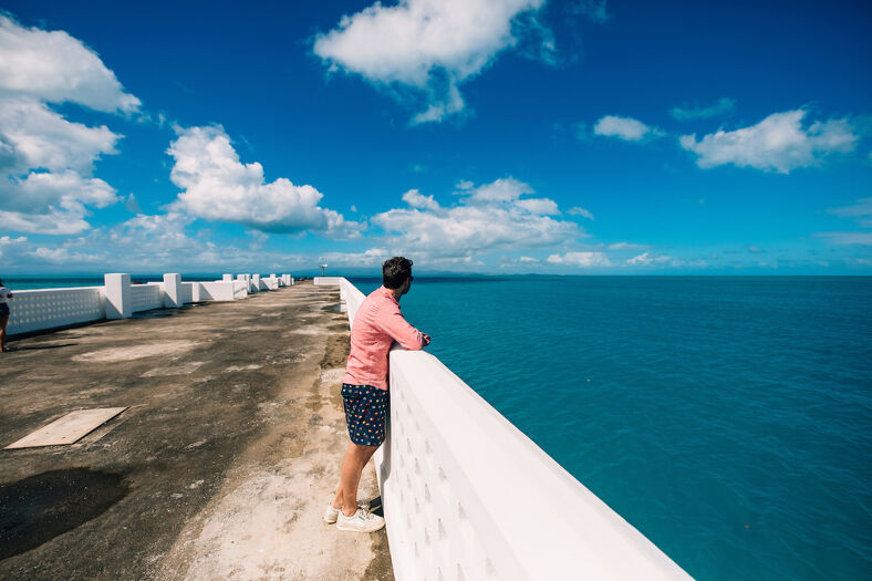 a man looks at the view from Mosquito pier.