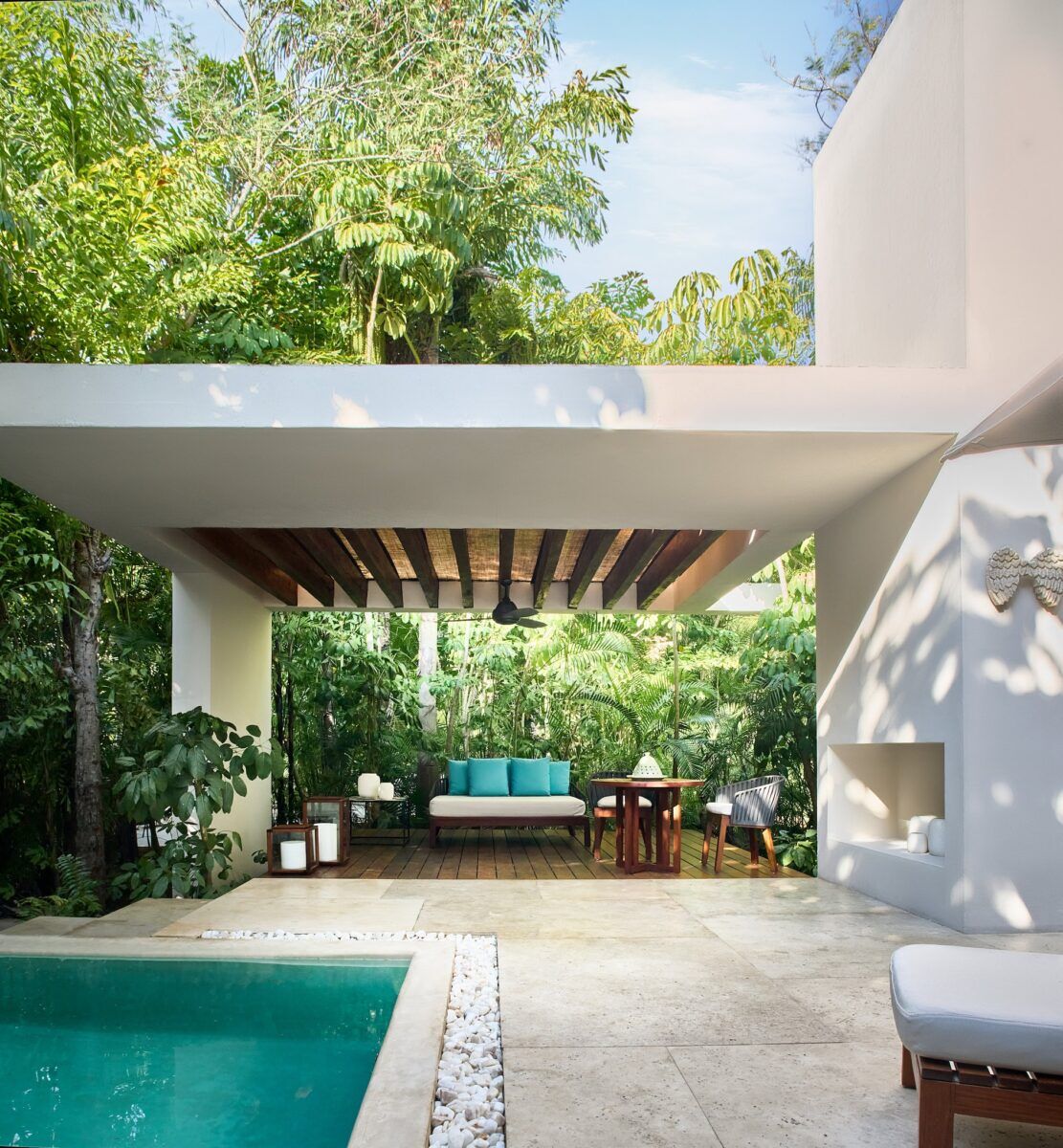 Upscale poolside lounge area at Chable Yuca