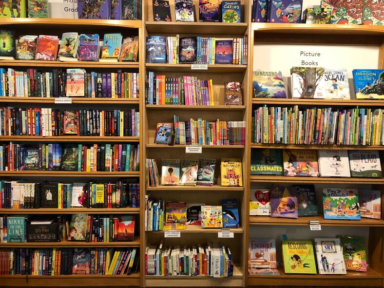 A picture of books on the shelves at Tombolo Books.