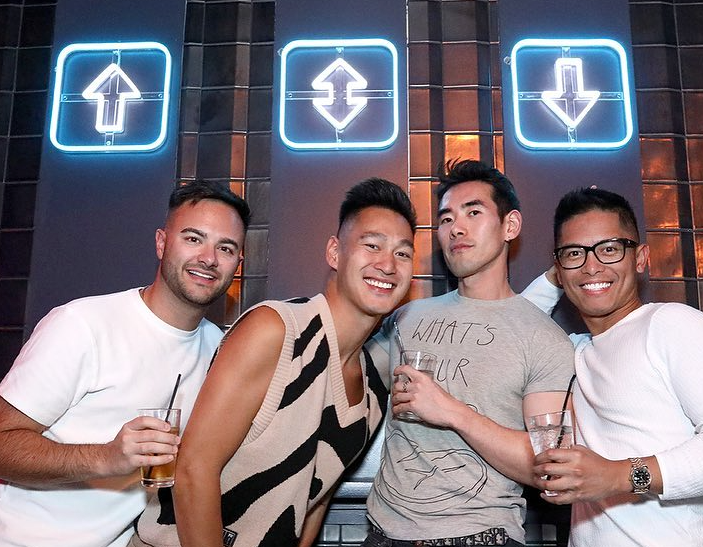 Four guys at a gya bar