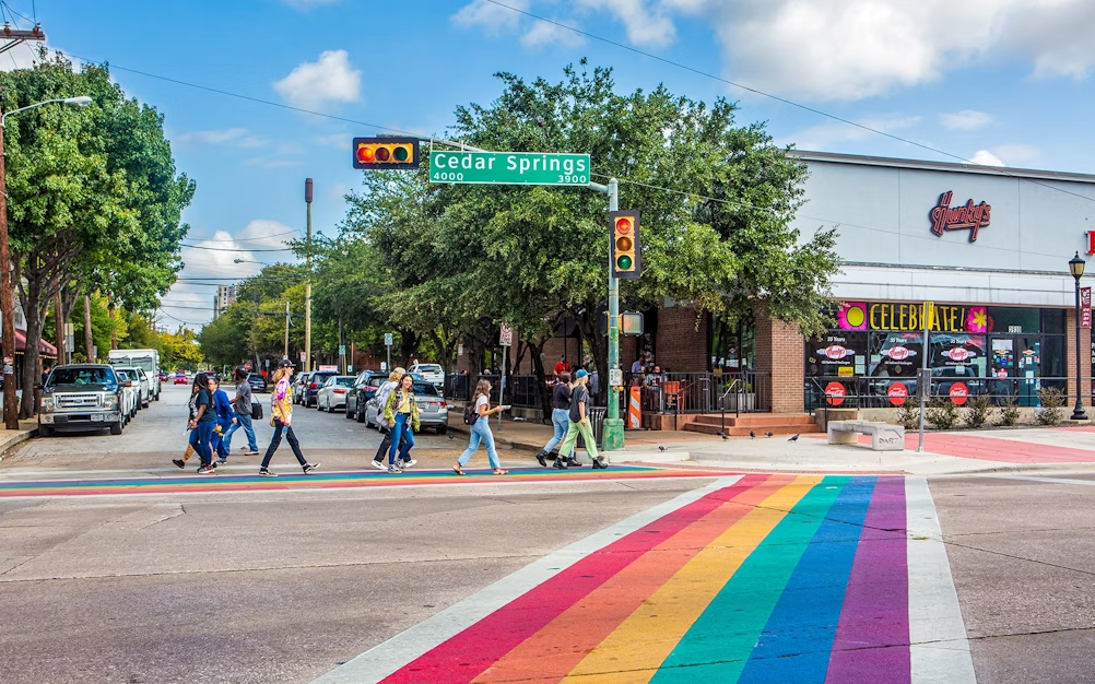 A rainbow crosswalk in the Oak Lawn neighborhood of Dallas. Photo via visitdallas.com