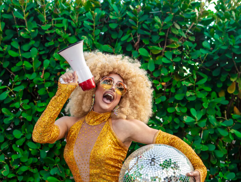 drag queen with a megaphone