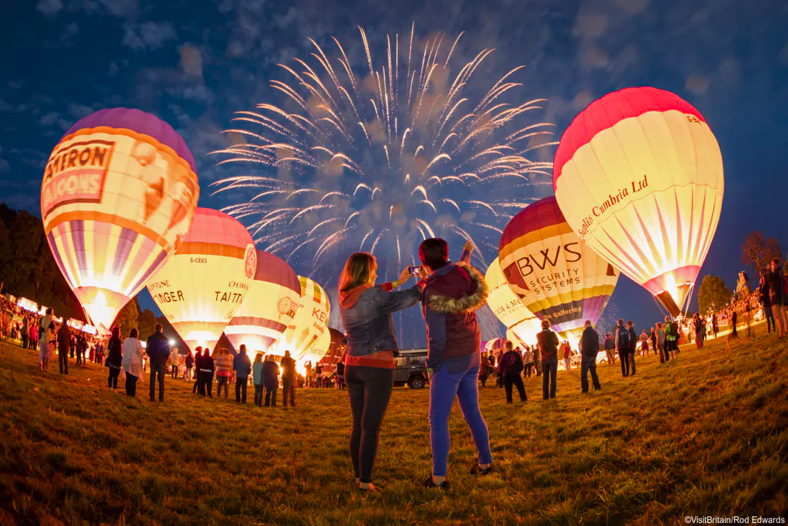 Illuminated hot air balloons on the ground at the Bristol International Balloon Fiesta