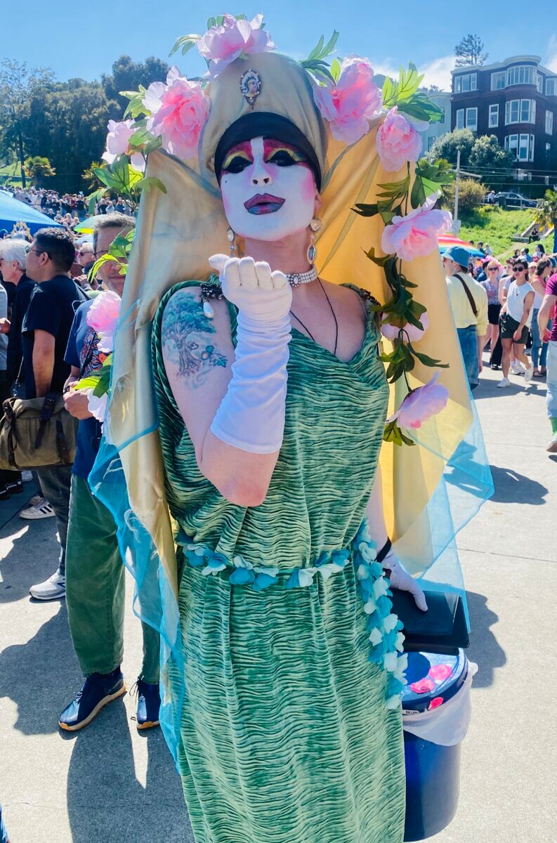 A Sister of Perpetual Indulgence collecting donations.