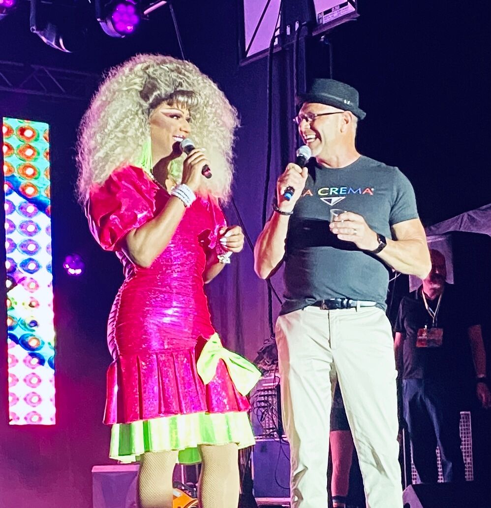 Jessica Wild and Robert Rainwater manning the stage at the 'Back to the 80's Bash.' 