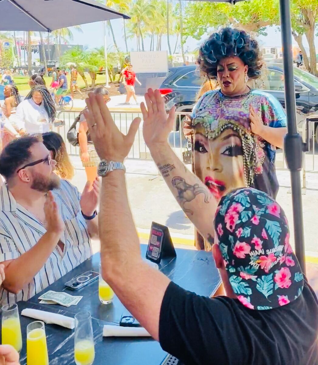 A local drag queen giving life at The Palace's drag brunch.