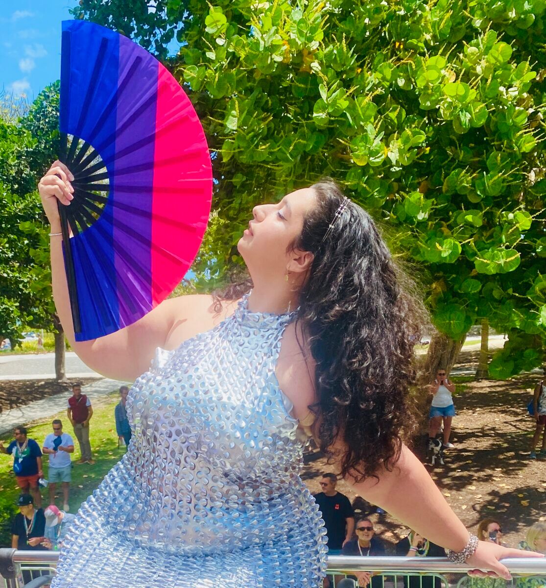 Argentinian influencer Augustina Cabaleiro living her best life ontop of a Miami Beach Pride parade float.