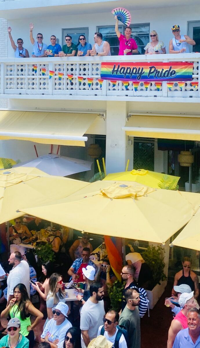 Locals flocking both the streets and balconies to view the parade.