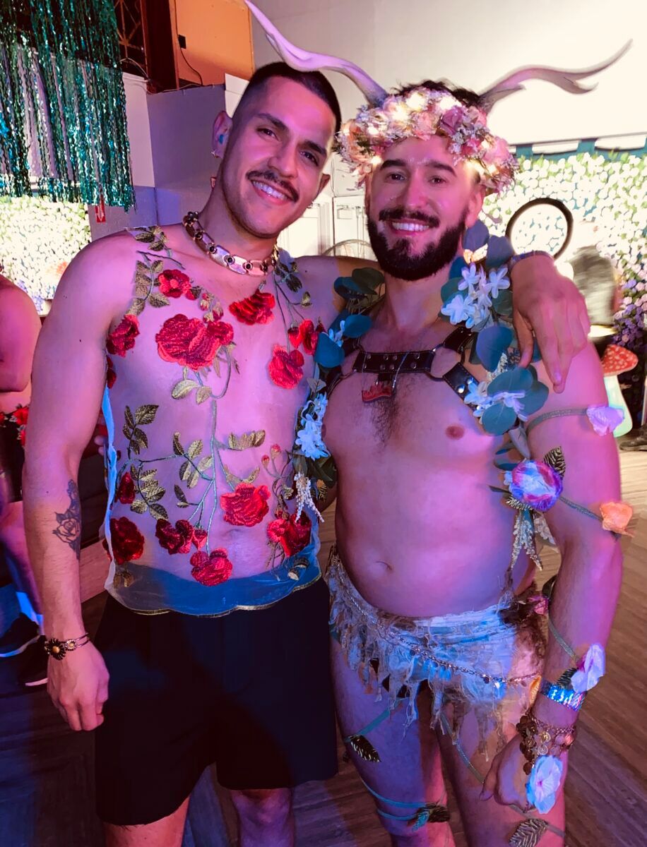 Athen (right) embraces his Burning Man persona of "Stag" with his horny headpiece.