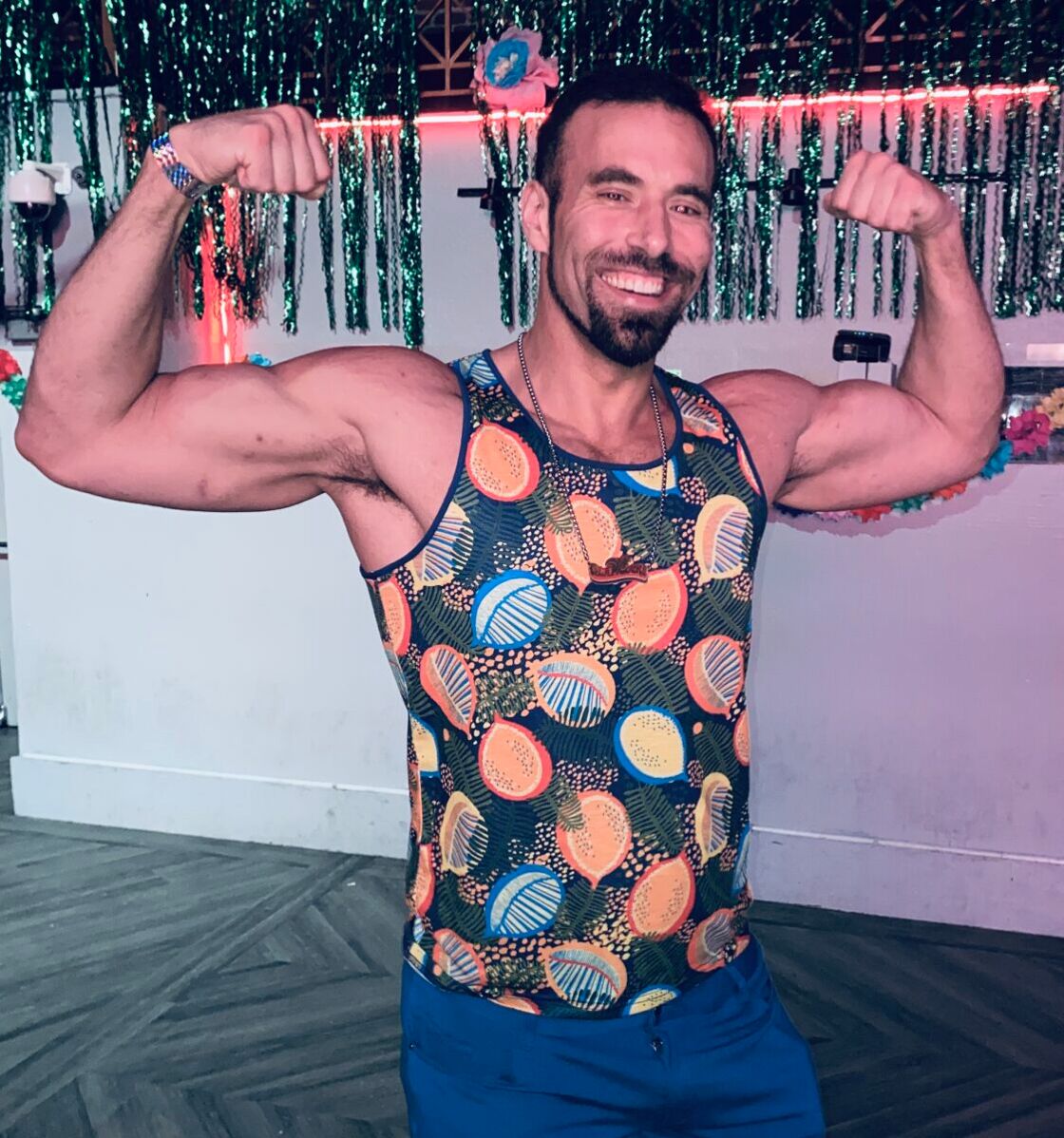 The Glamcock's resident muscle stud Seth flexing his floral-clad physique.