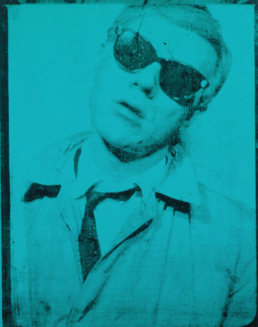 A 1964 blue self-portrait of Andy Warhol sporting sunglasses and wearing a tie and jacket.