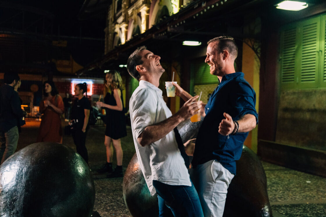 A gay couple dances on the street in San Juan, Puerto Rico.