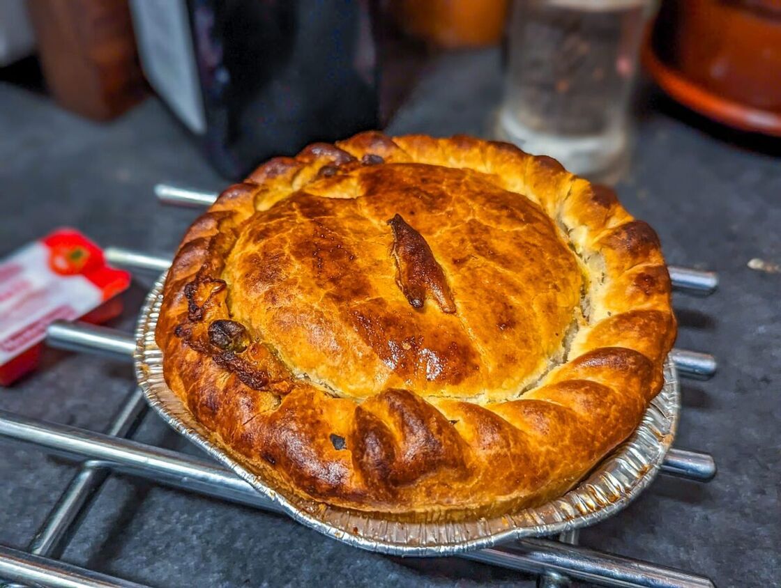 A baked spicy broccoli, cauliflower, and okra "meat" pie.