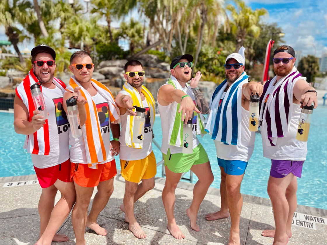A group of six men celebrate Gay Days in Orlando, Florida