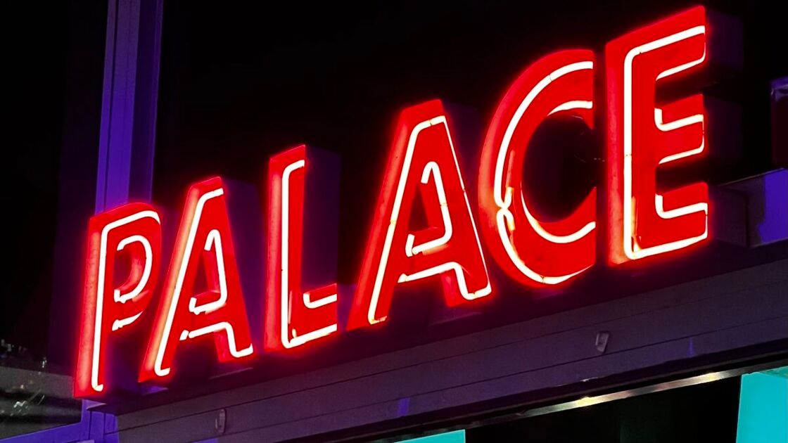 View of the neon "PALACE" sign outside Palace Bar