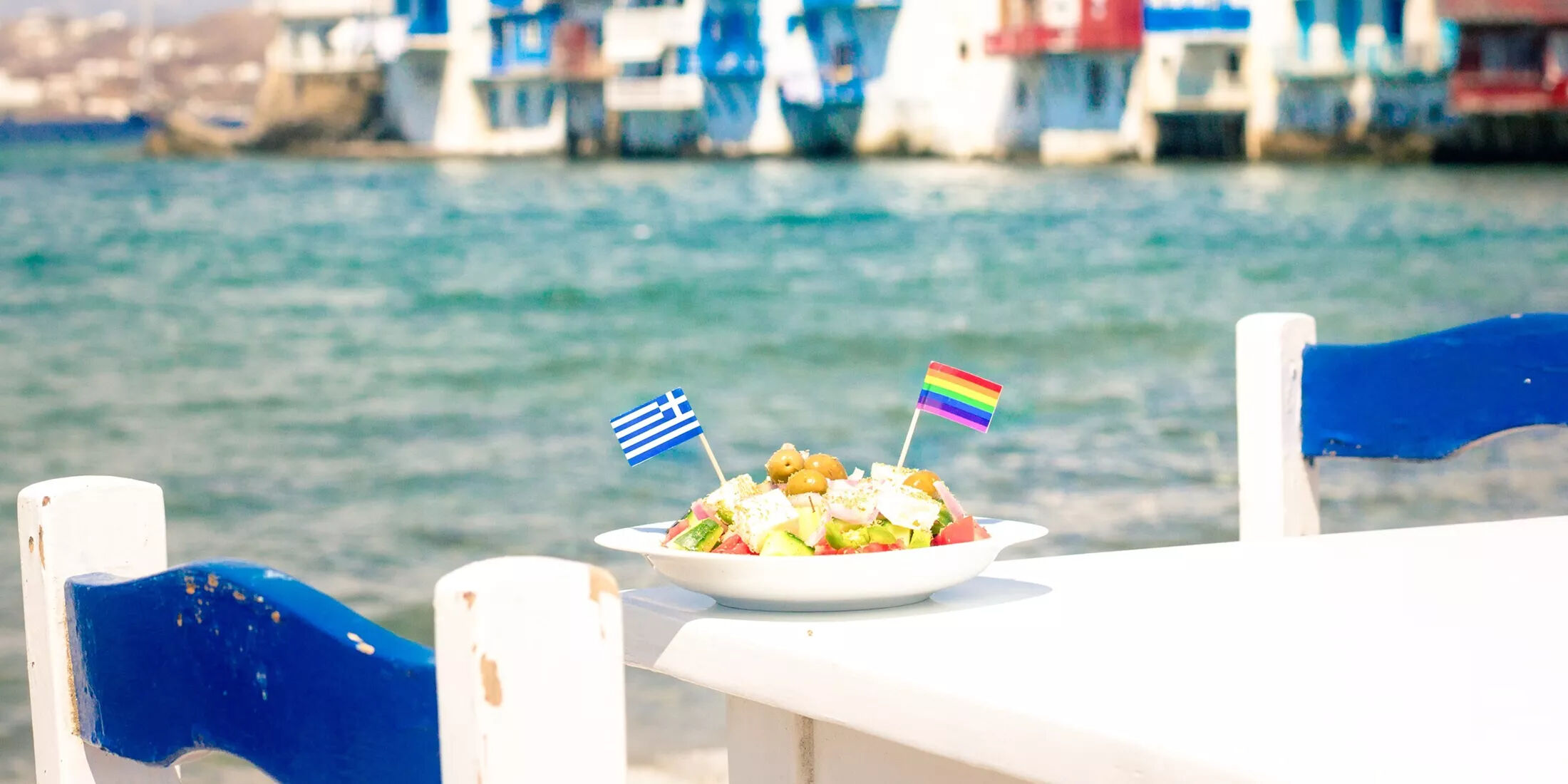 Here's how to sunbathe on a gorgeous beach in Greece while helping LGBTQ+ refugees