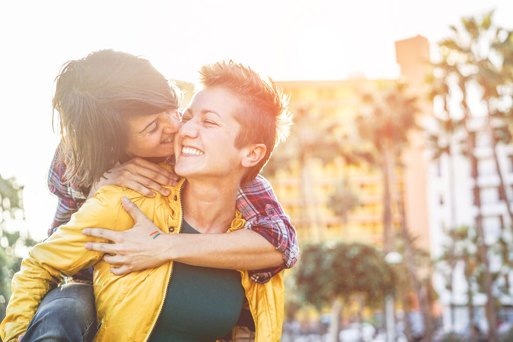 Young millennials women having a date outdoors