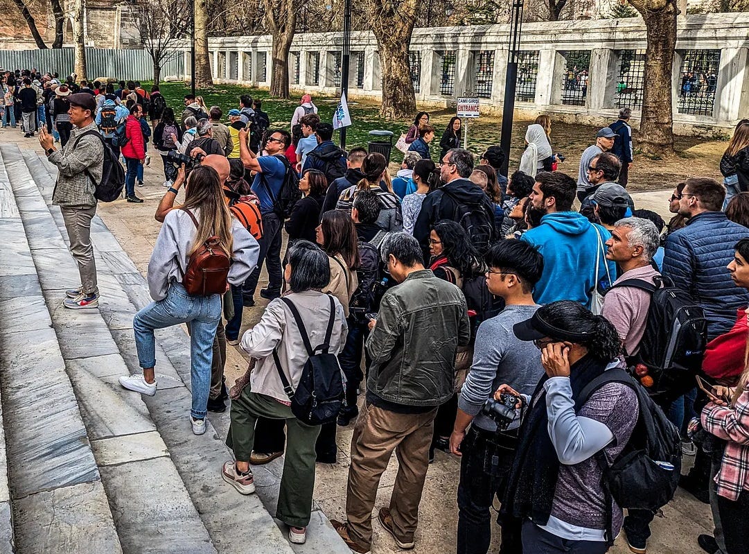 At 9 am in April, the line for the Blue Mosque already stretches around the building.