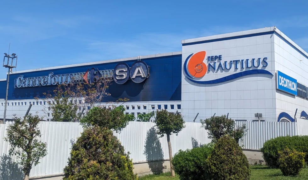 Exterior photo of the Nautilus Mall. Nautilus Mall includes a huge Carrefour grocery store.