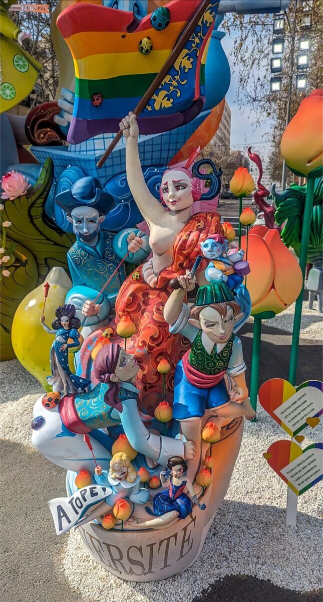 Verite surrounded by colorful cast of characters.