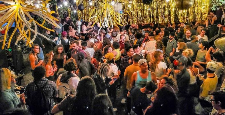 A crowd of people at El Rio bar in San Francisco