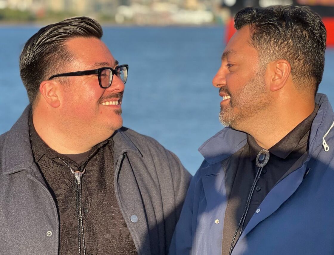A couple aboard Seattle's Love For All Boat. 