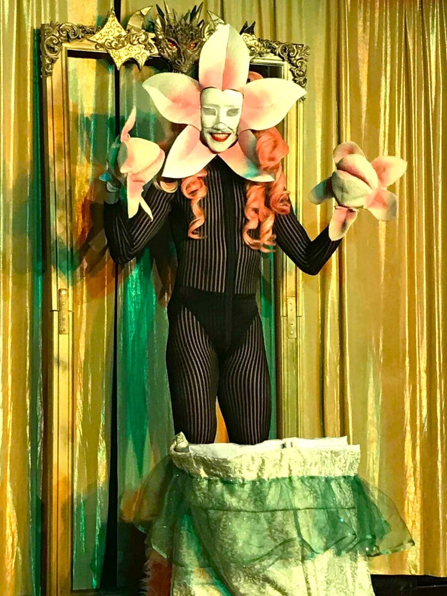 A performance artist dressed like a giant flower at Royal Vauxhall Tavern