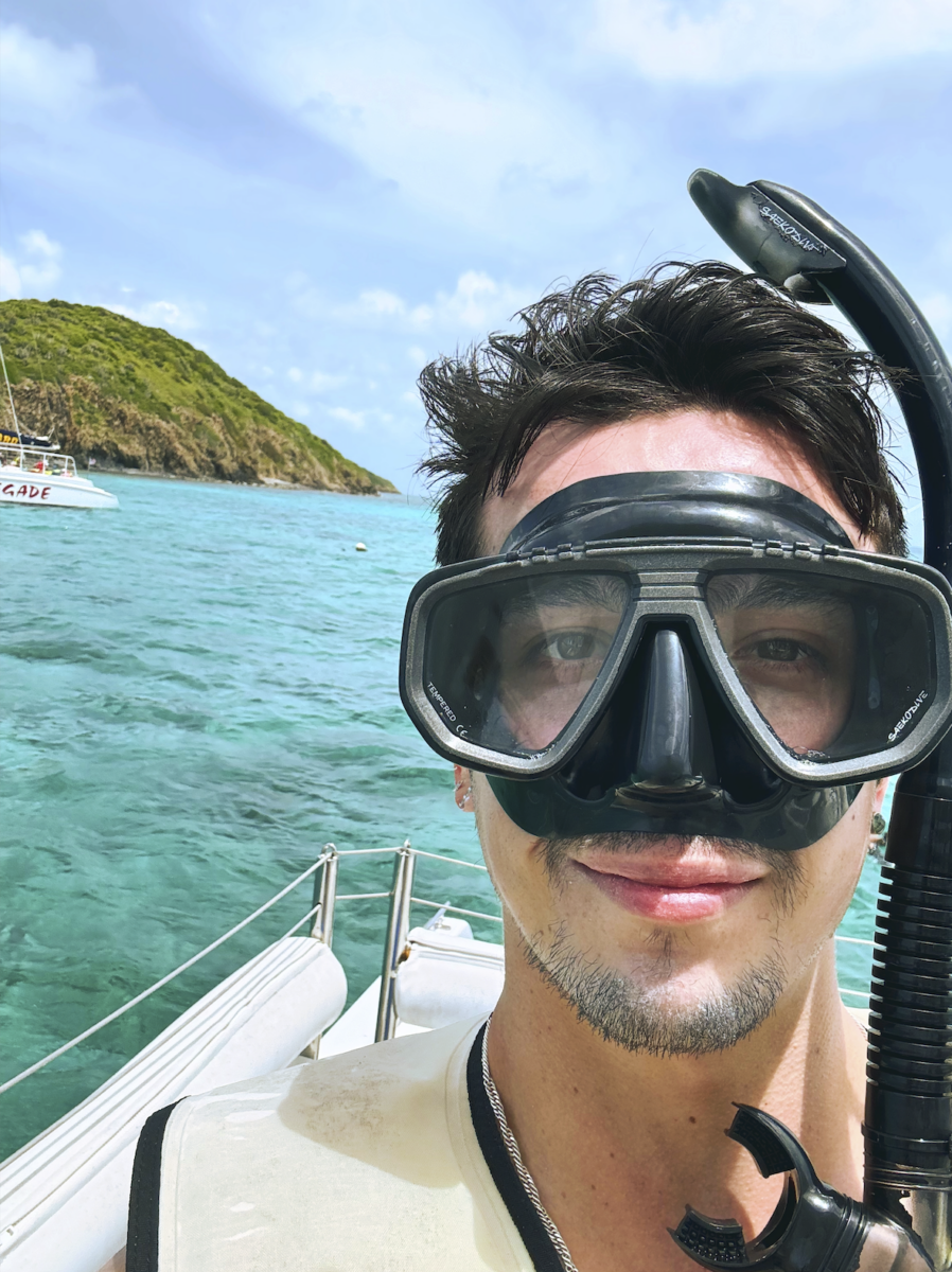 Me on the boat with the snorkeling gear. 
