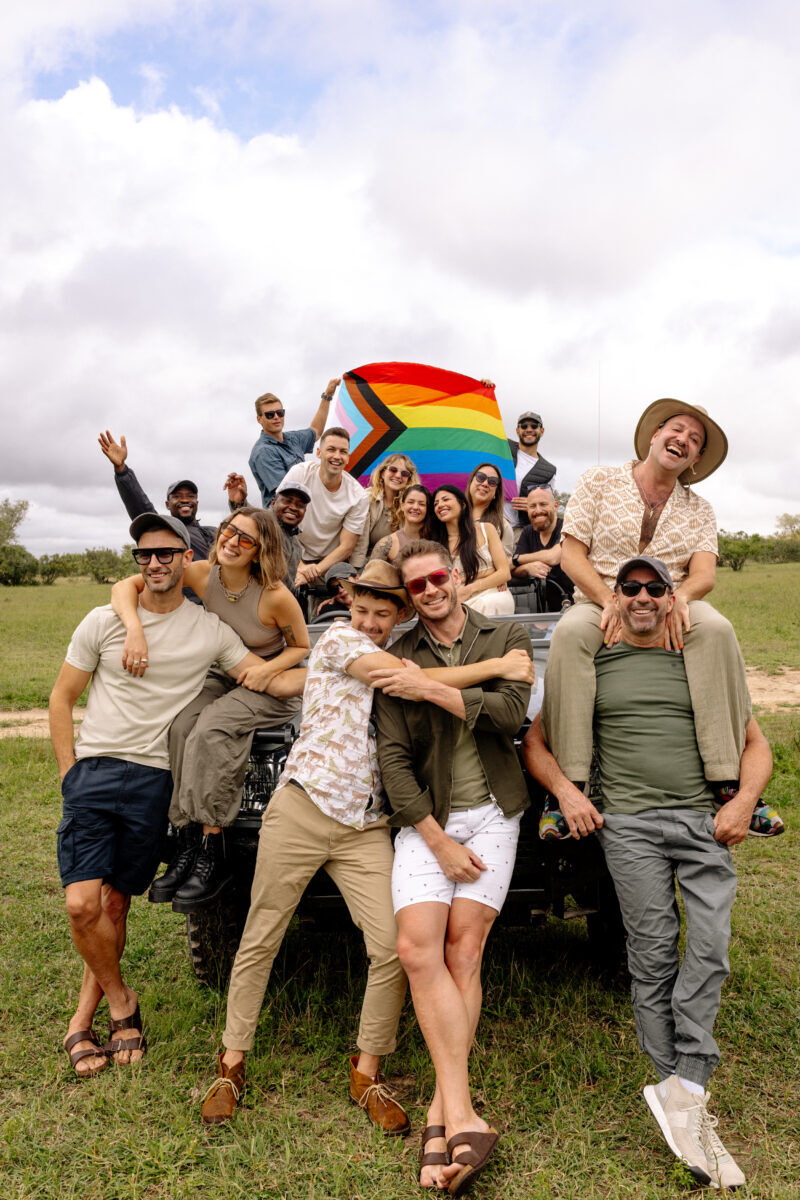 A group of LGBTQ+ travelers on safari with Out2Africa.