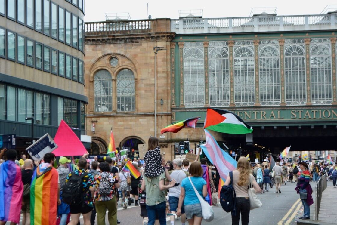 The parade carries on through an overhang of Glasgow Central Station.