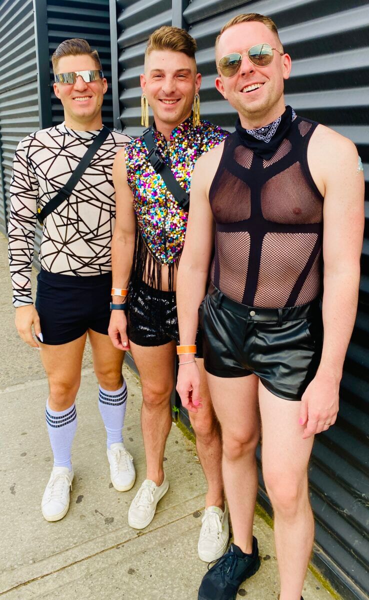 Three gays in leather shorts at New York Pride