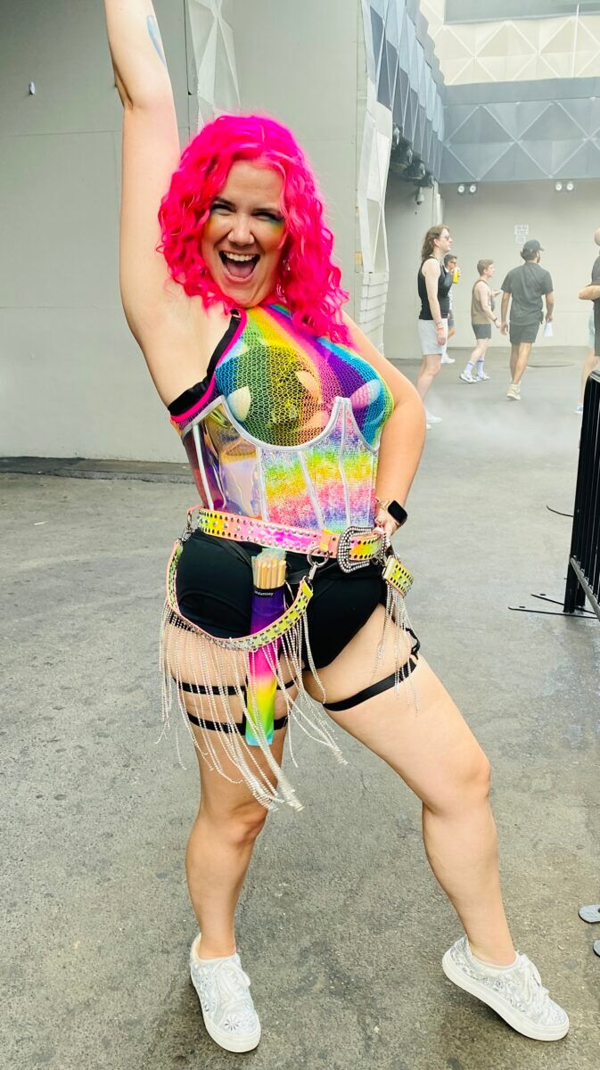 Extra girl in rainbow top at New York Pride