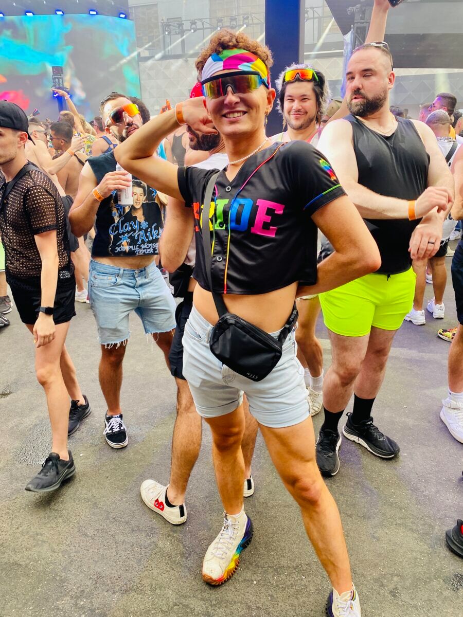 A boy in a "PRIDE" t-shirt