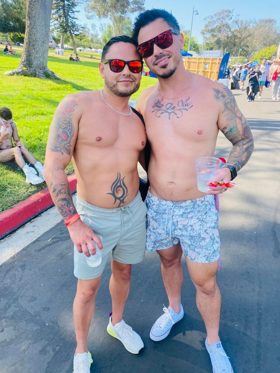 shirtless San Diego Pride couple