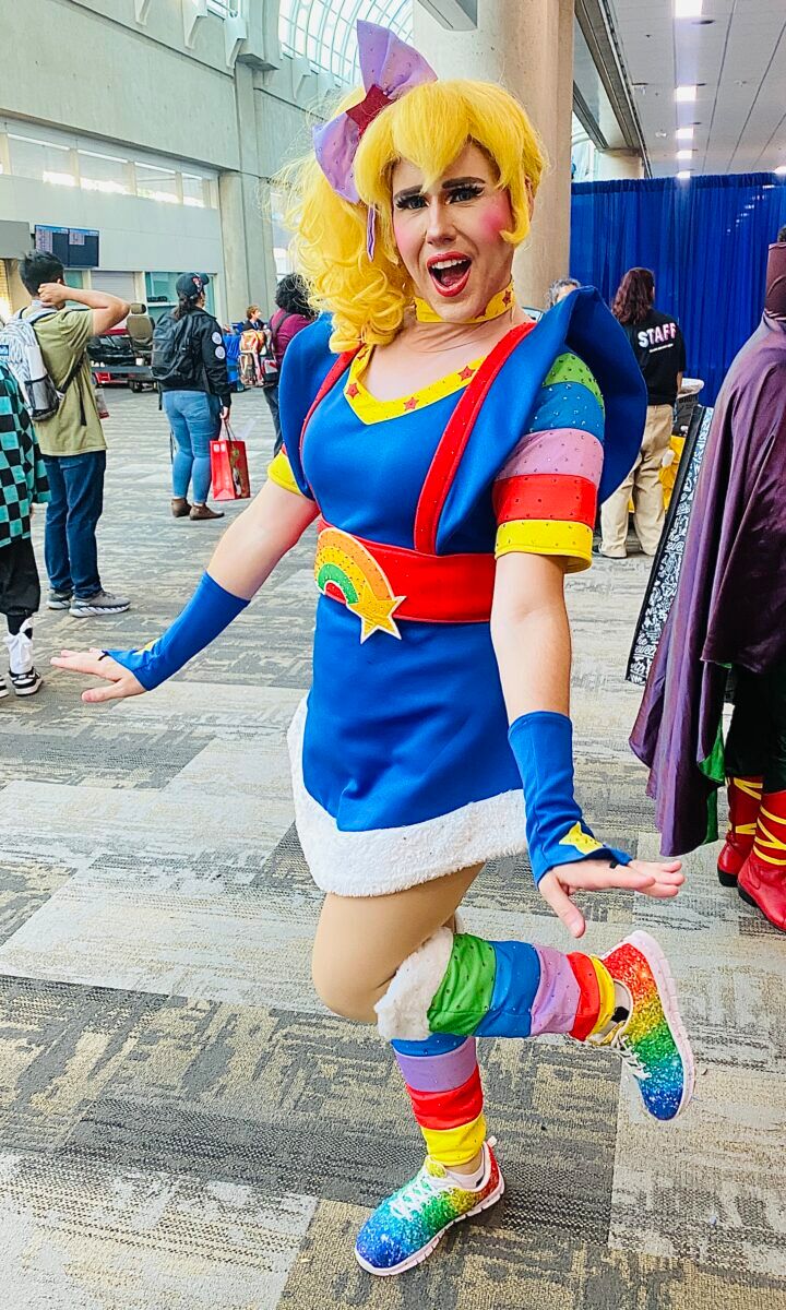 Prominent queer cosplayer Jimmy Sherfy serving retro realness with his Rainbow Brite lewk at SDCC 2023