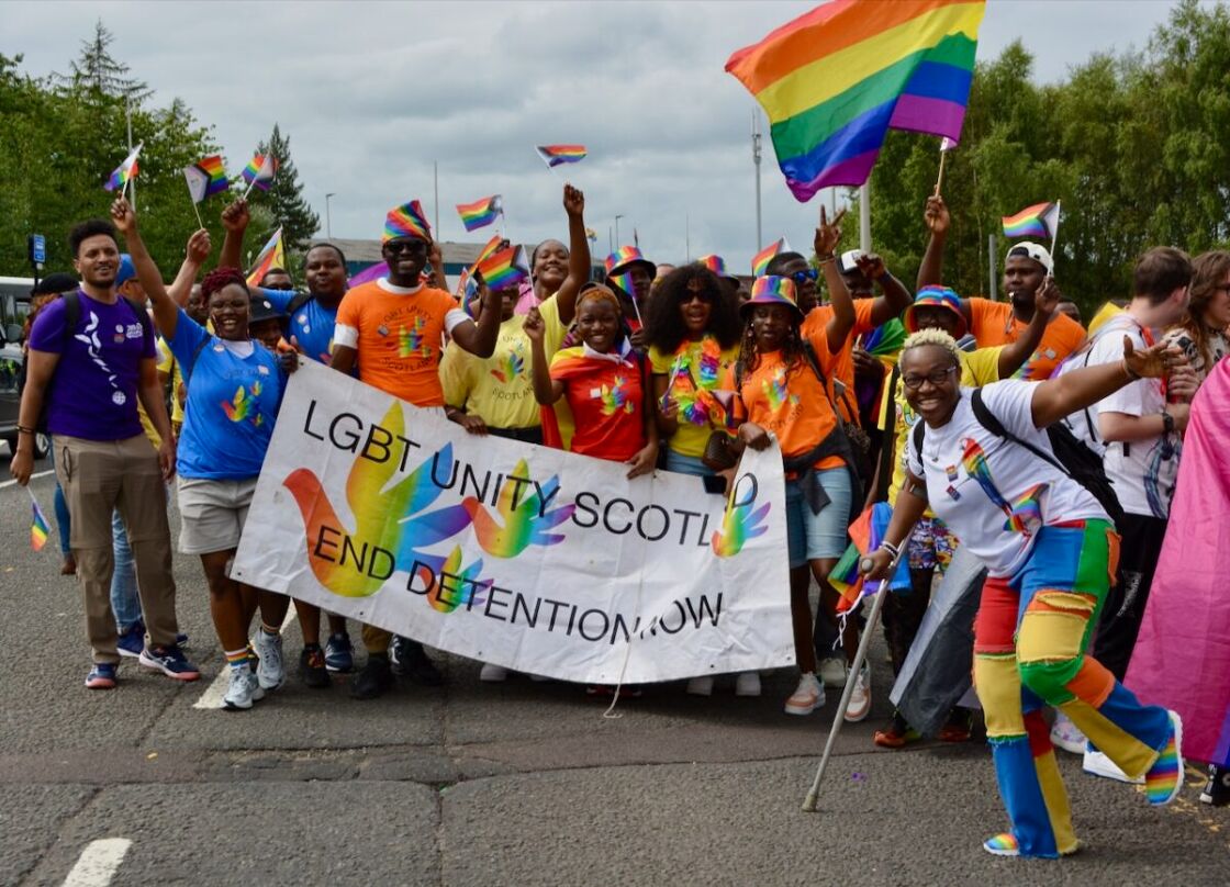 Members of the LGBT Unity Scotland group march in the parade.