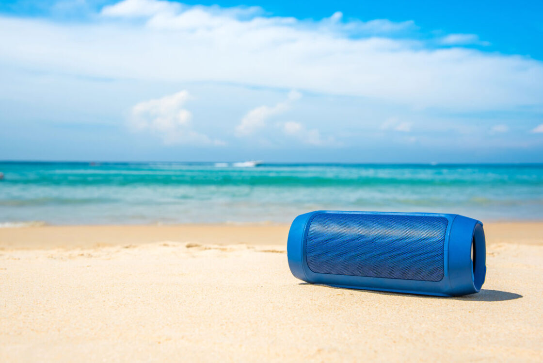 Portable speaker on the beach